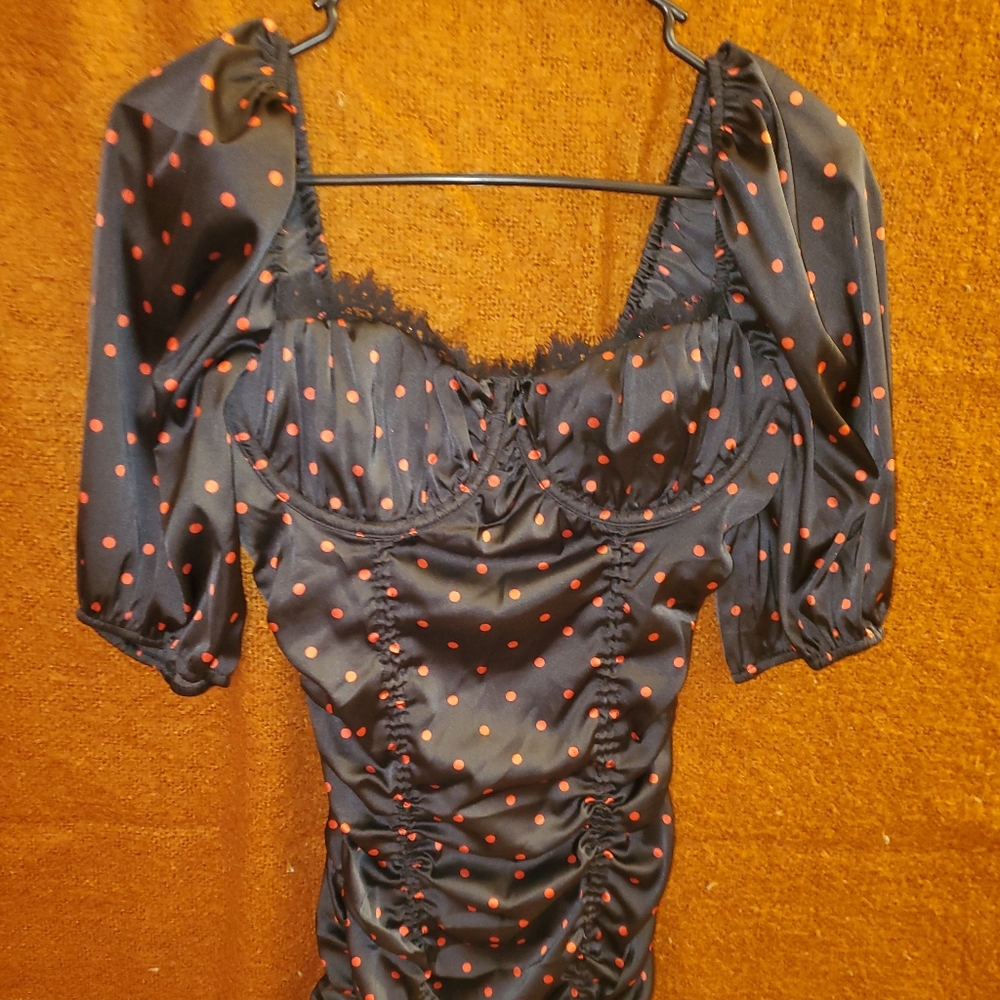 Black dress with red poka dots